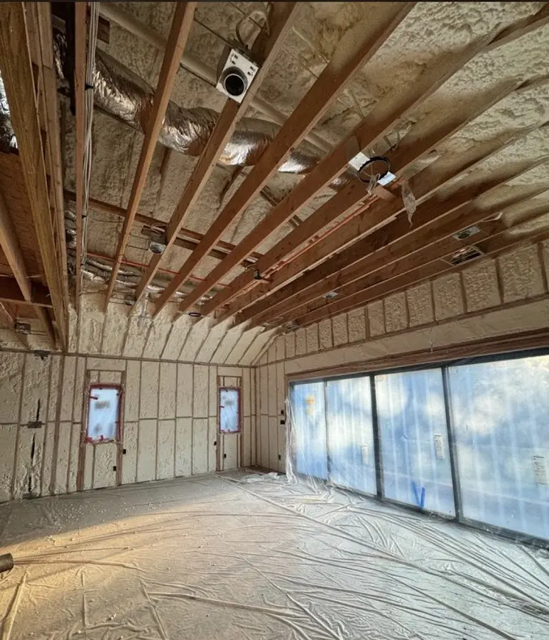 Interior walls and ceiling insulated with spray foam during new construction in Elkton
